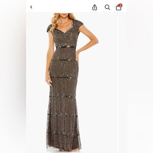 Beautiful charcoal, gray beaded evening gown with capped sleeves